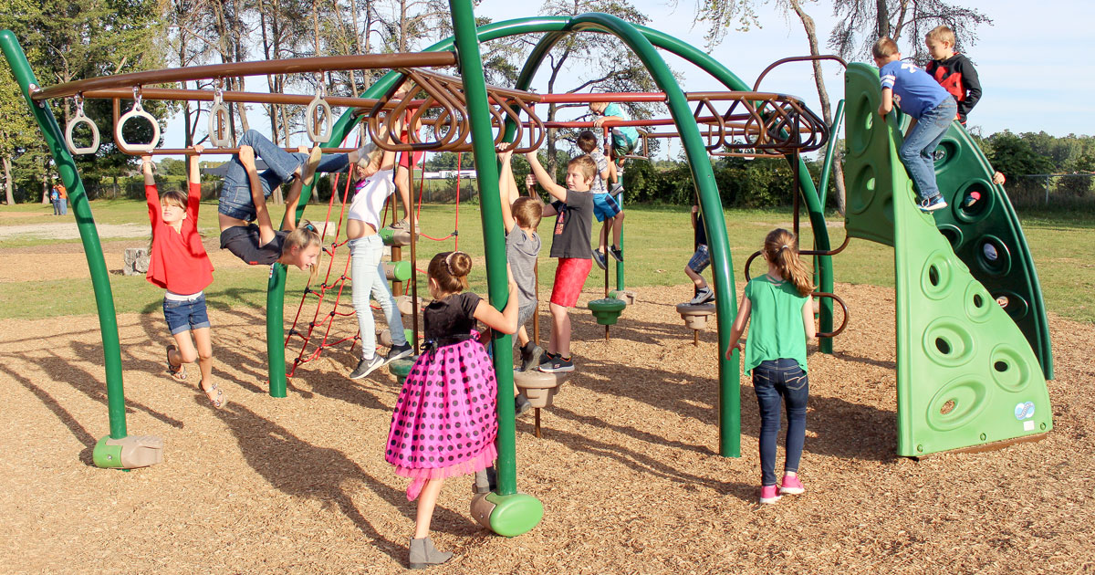 Students, families, and community members enjoyed the warm weather while celebrating the playground opening