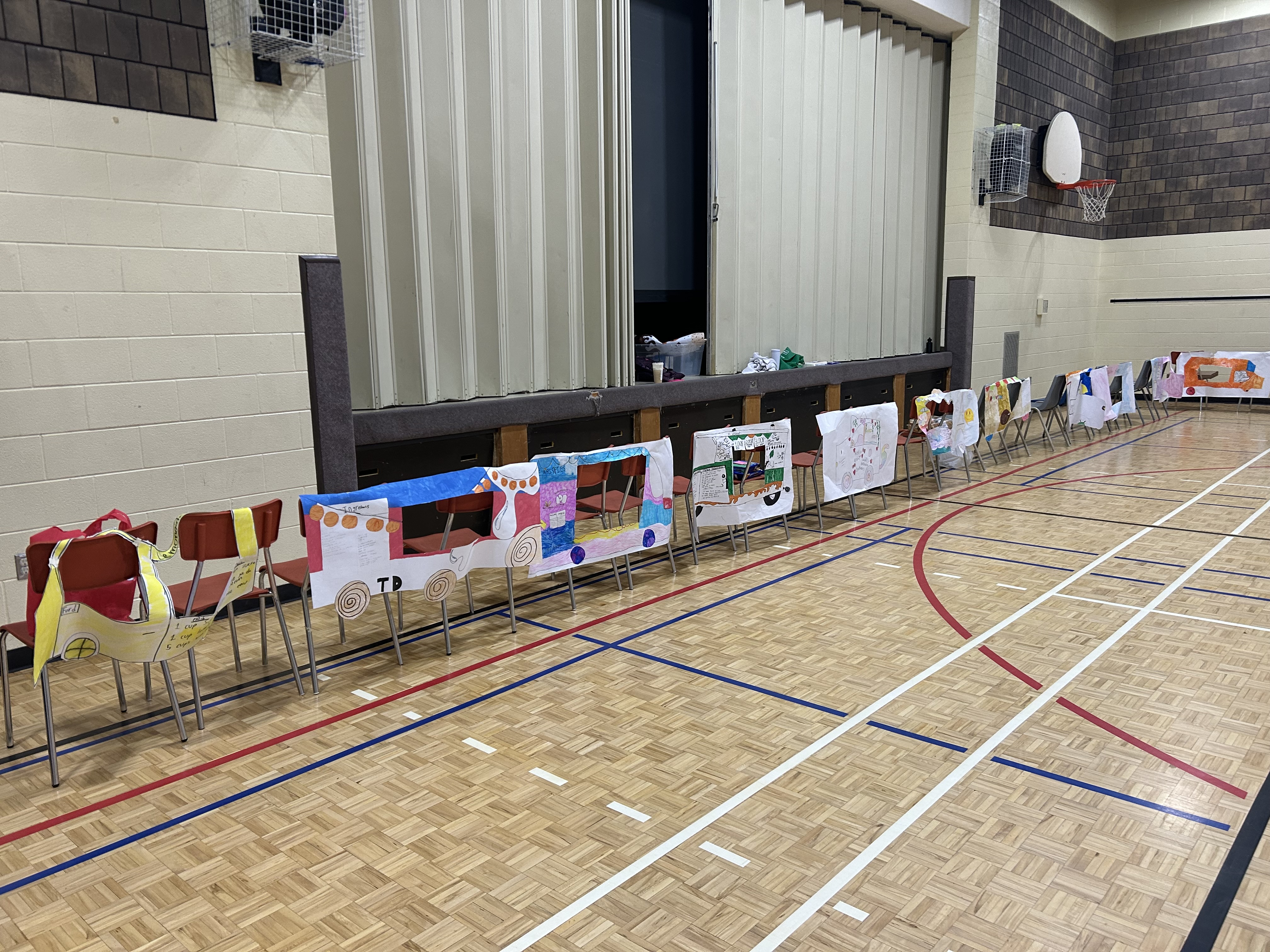 The gym was filled with food trucks awaiting the students to start shopping.