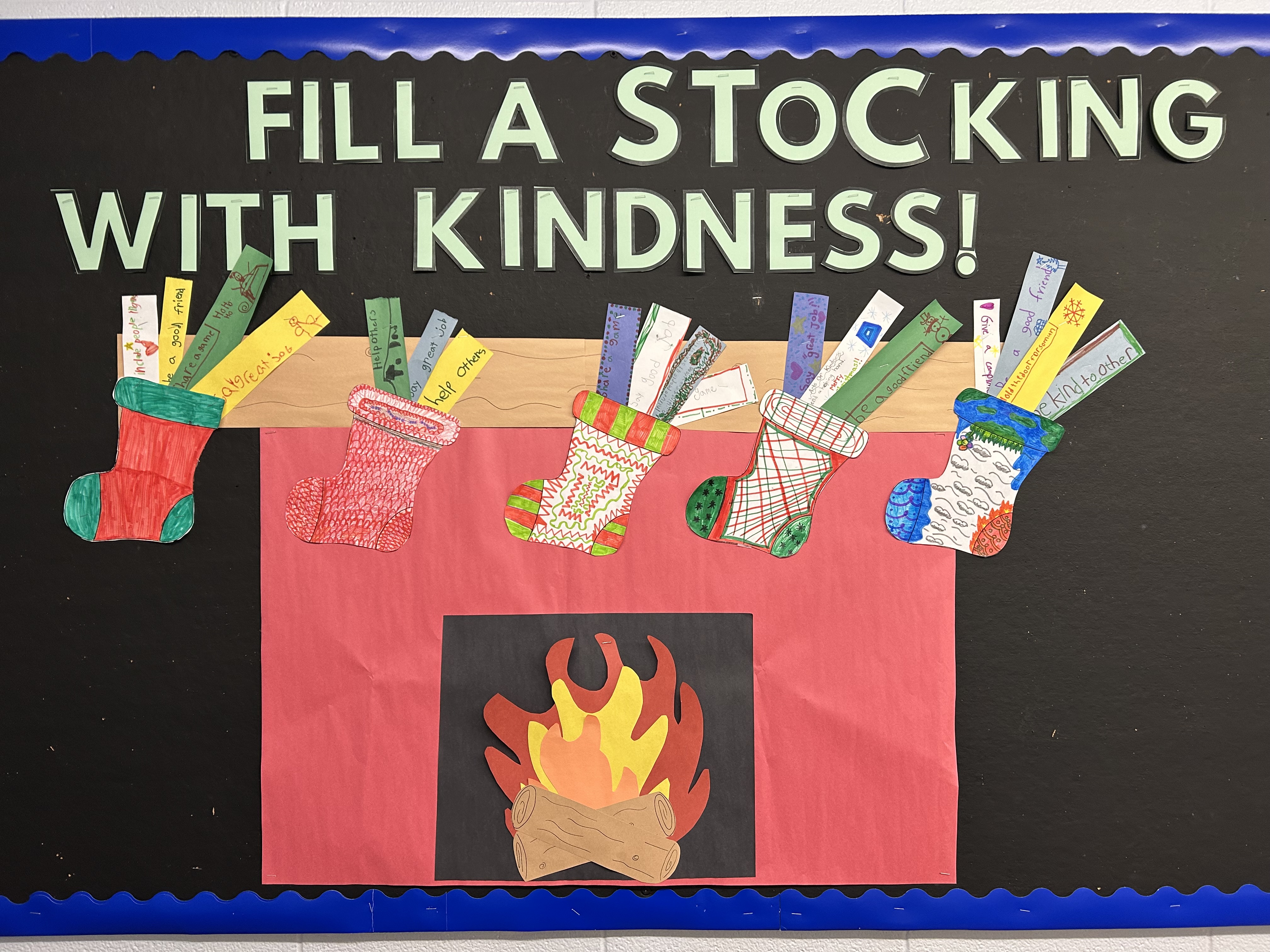 A picture of a Bulletin with stocking filled with kind suggestions. 