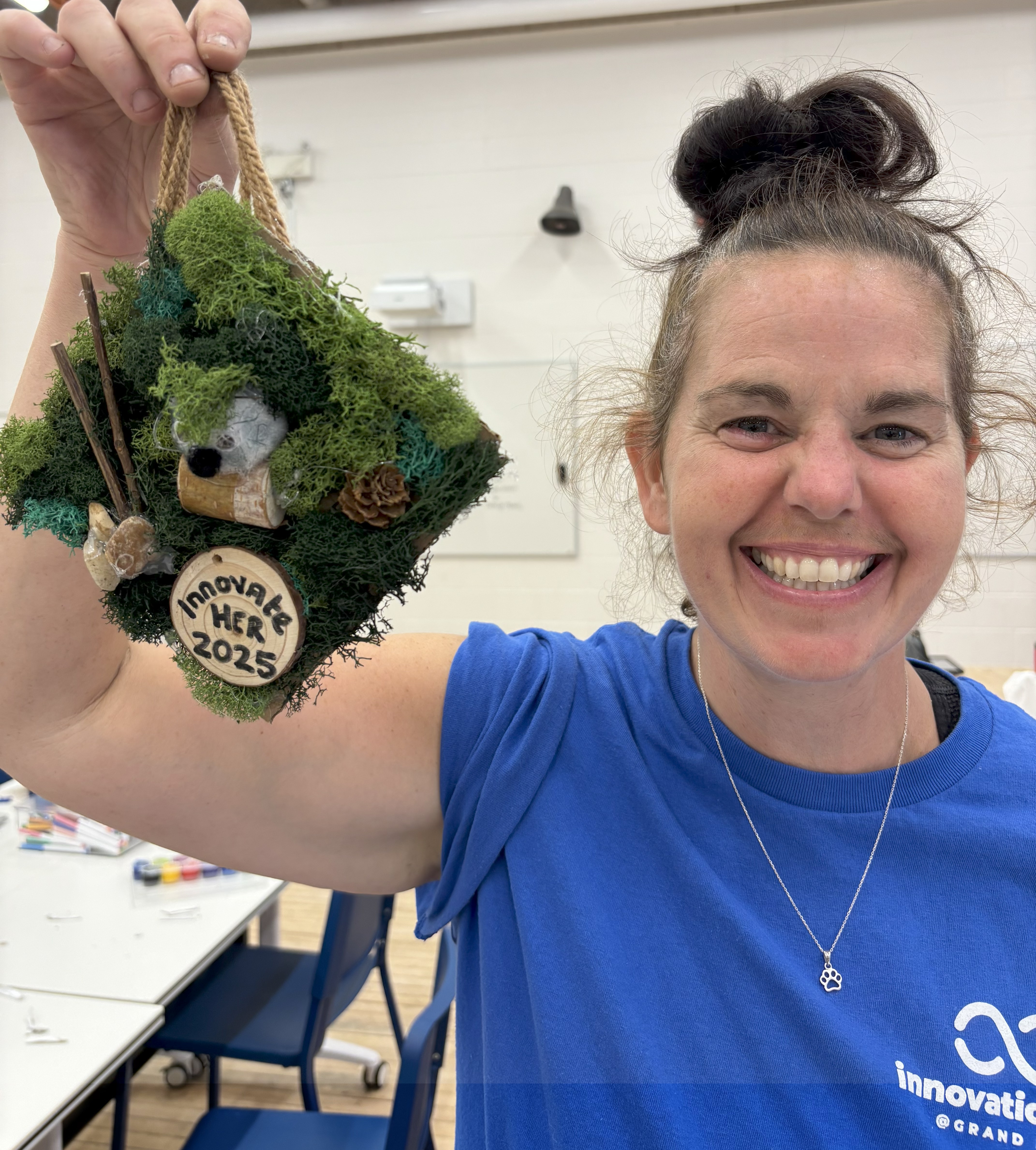 Emma Dailey displays InnovateHER camp craft