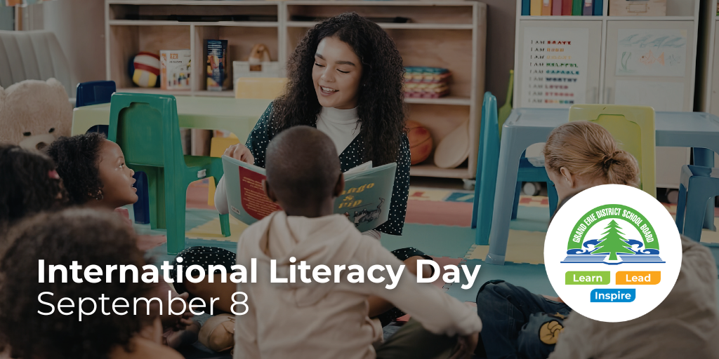 Educator reading a book to students on International Literacy Day, September 8
