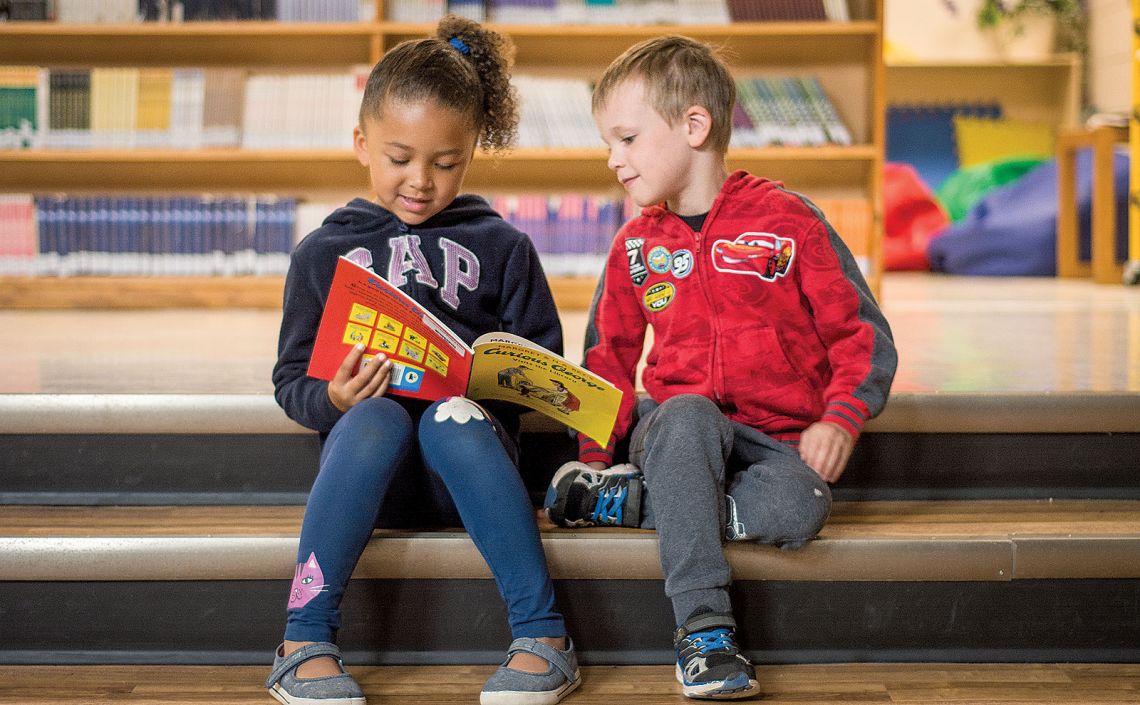 Children reading a book