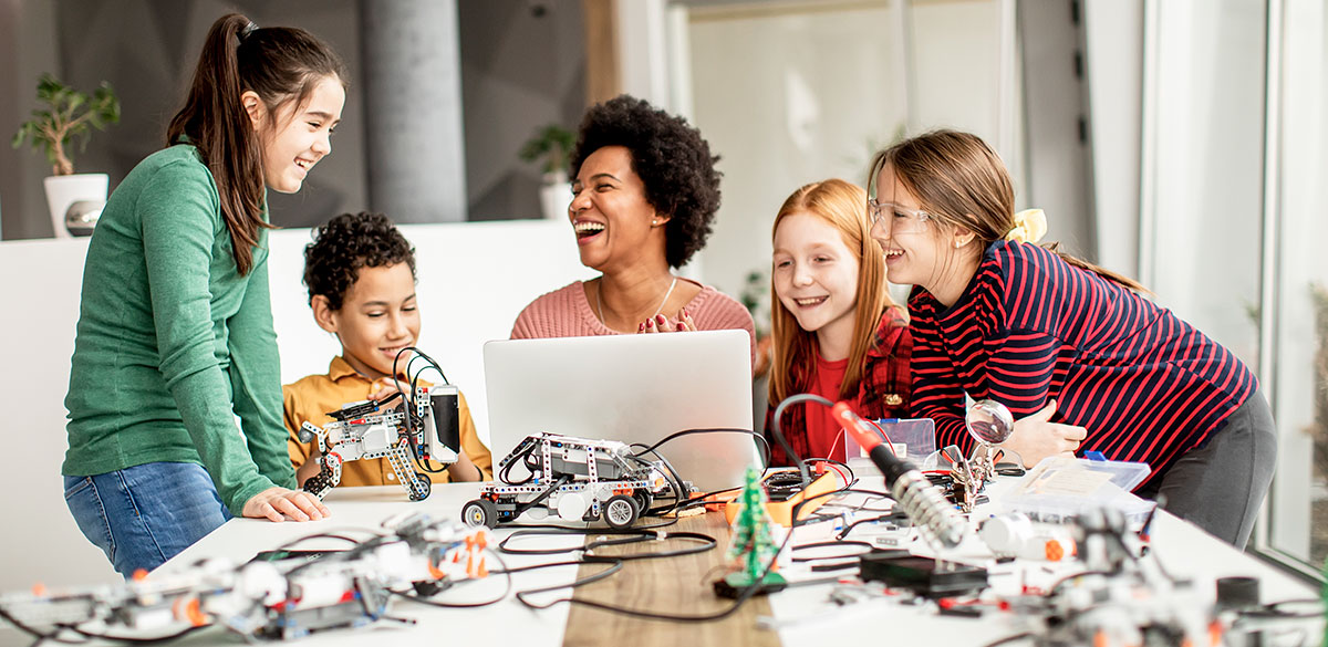 Family working on a robot