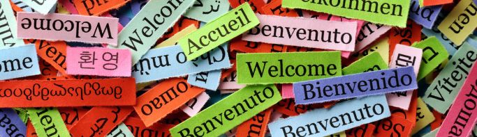 Collage with the word "Welcome" in many different languages