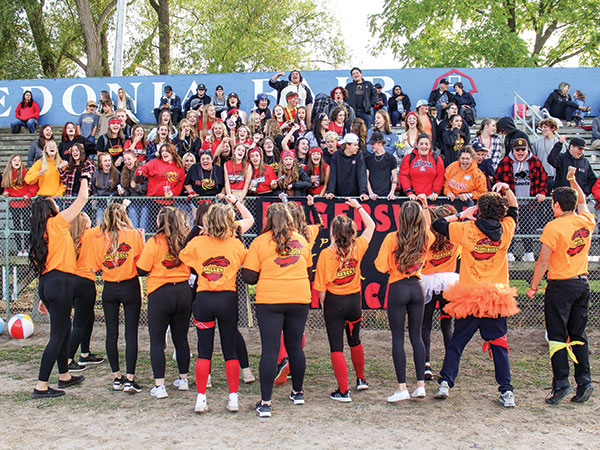 Cheerleaders cheering to a crowd