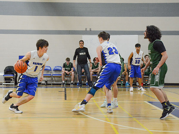 Students playing basketball