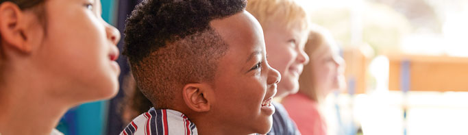 Kindergarten students in class having fun