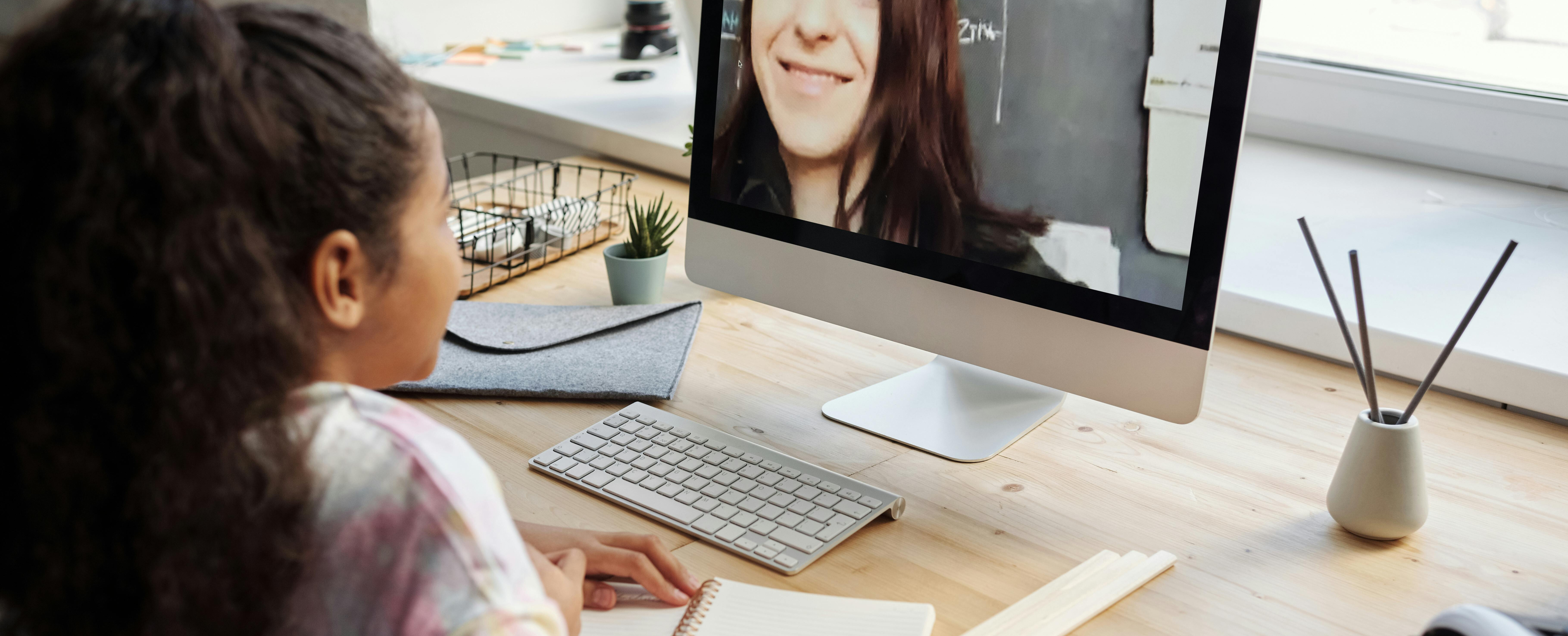 Girl watching a video on a computer