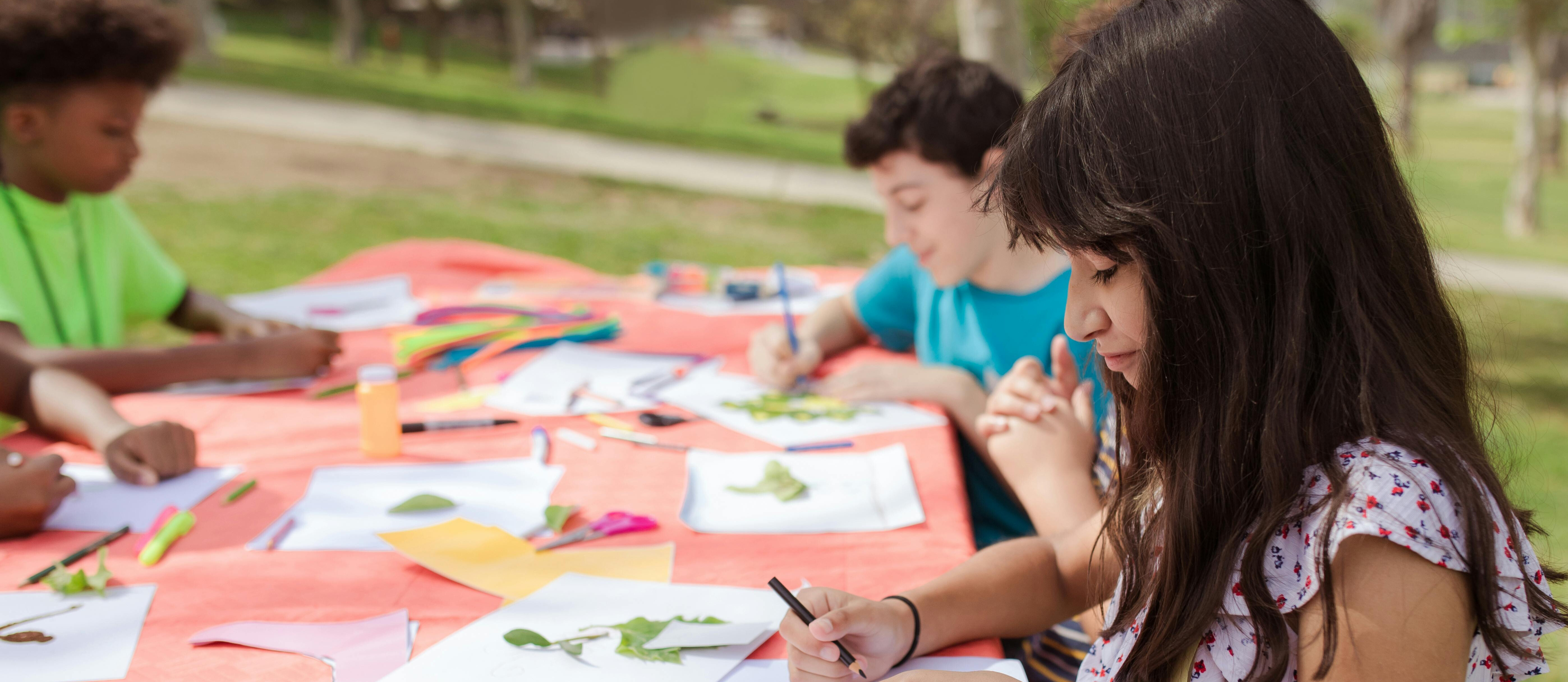 kids drawing on a table