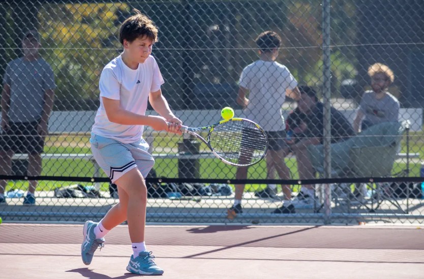 Brycen Maddock of NPC playing tennis