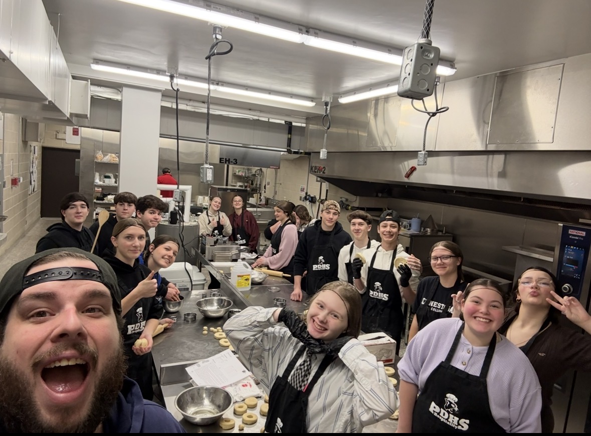Class selfie of students in hospitality and tourism class at Paris District High School
