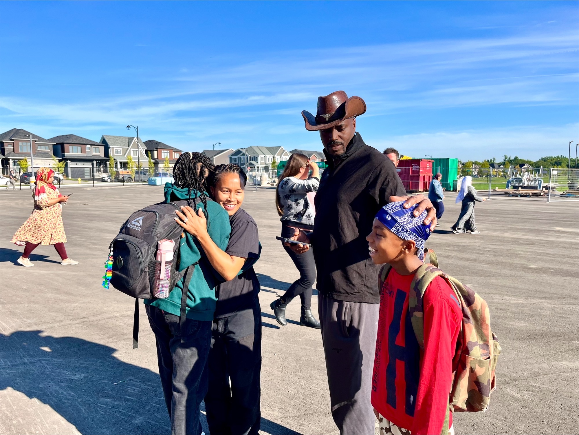 Students greeting friends on the first day of school