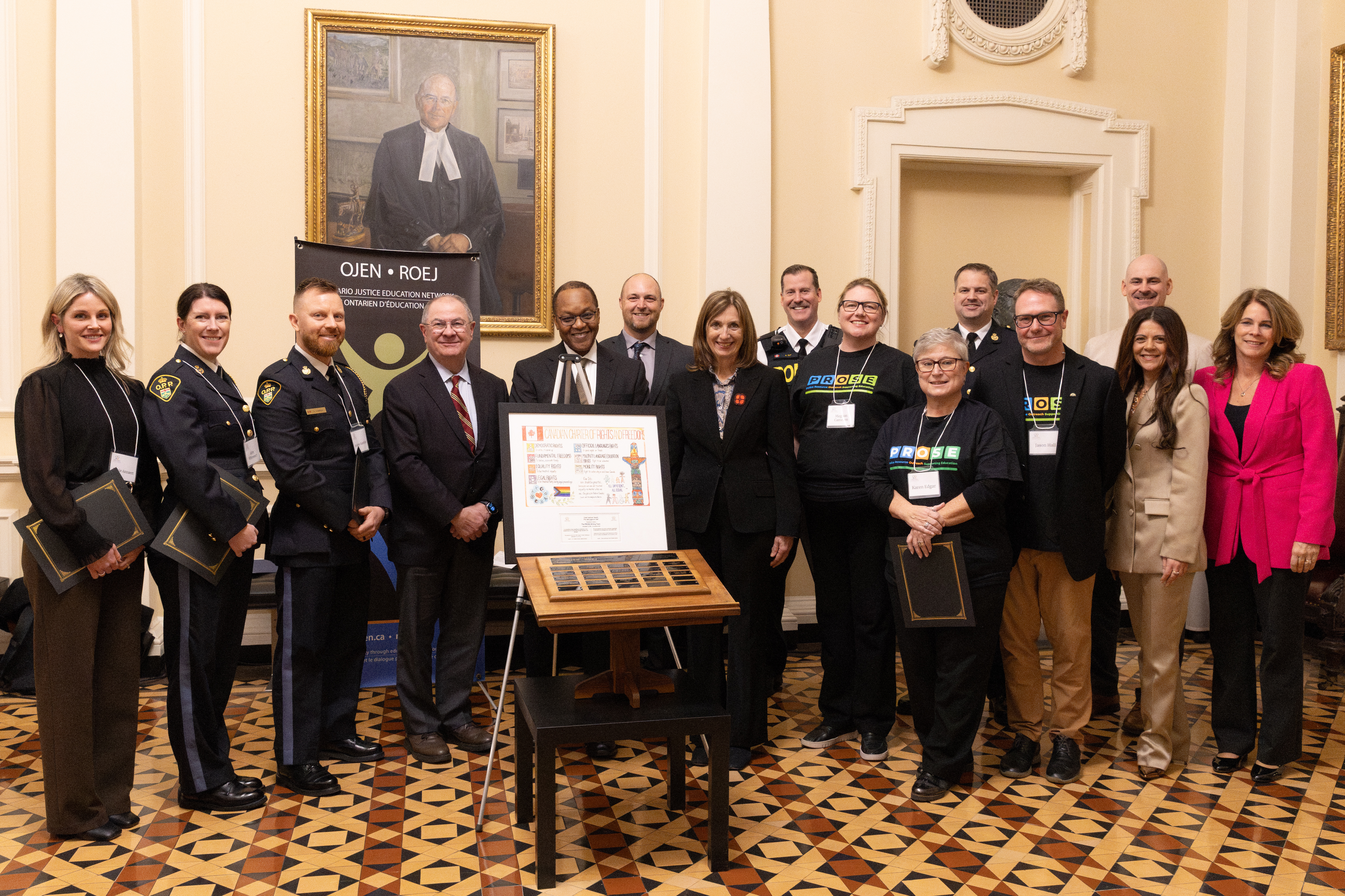 A group photo of OJEN Chief Justices’ Award recipients, Chief Justices of Ontario, and representatives from the Brantford Police Services and OPP, and the Grand Erie District School Board