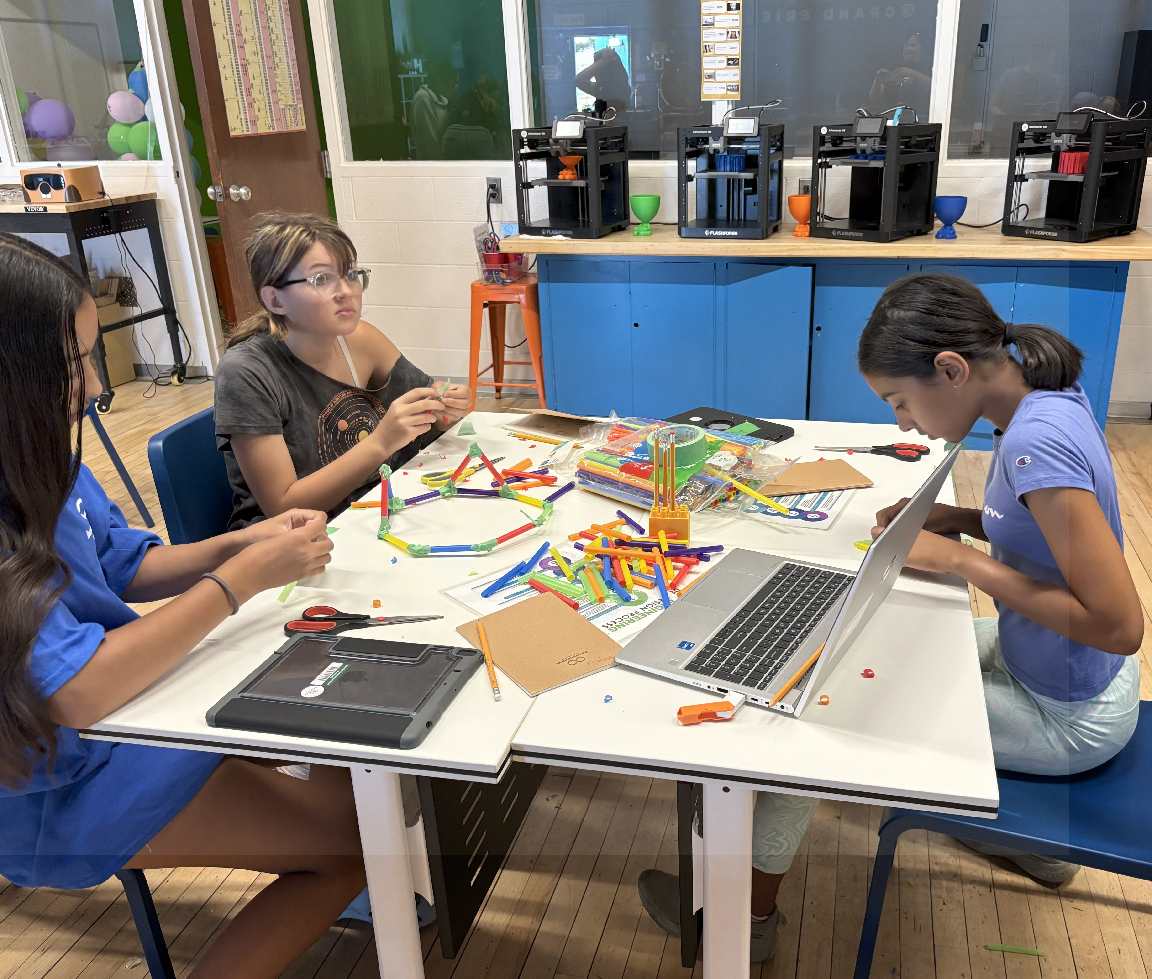 Children participating in InnovateHer Camp Activity