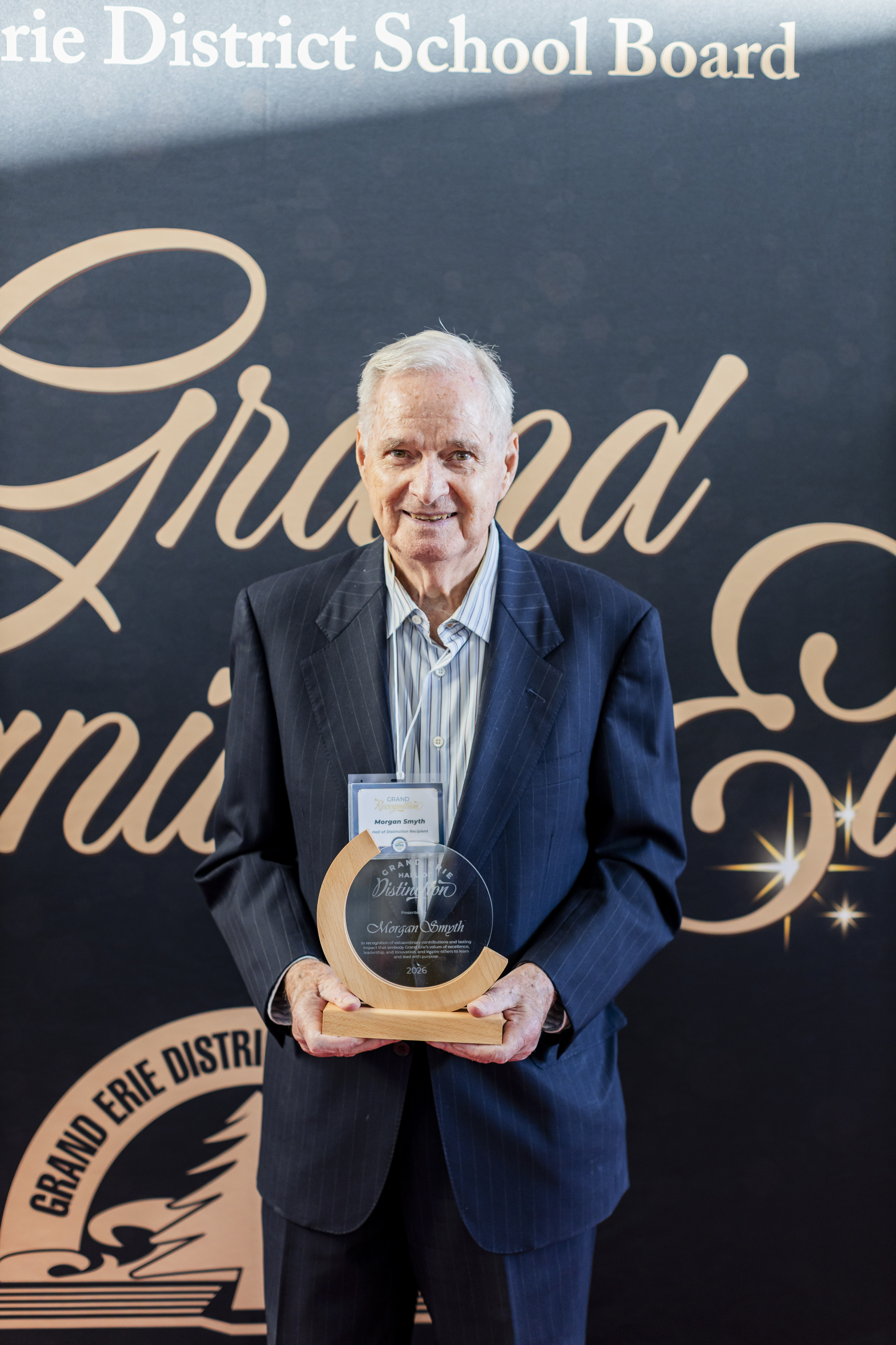 Morgan Smyth holding Hall of Distinction Award Morgan Smyth holding Hall of Distinction Award
