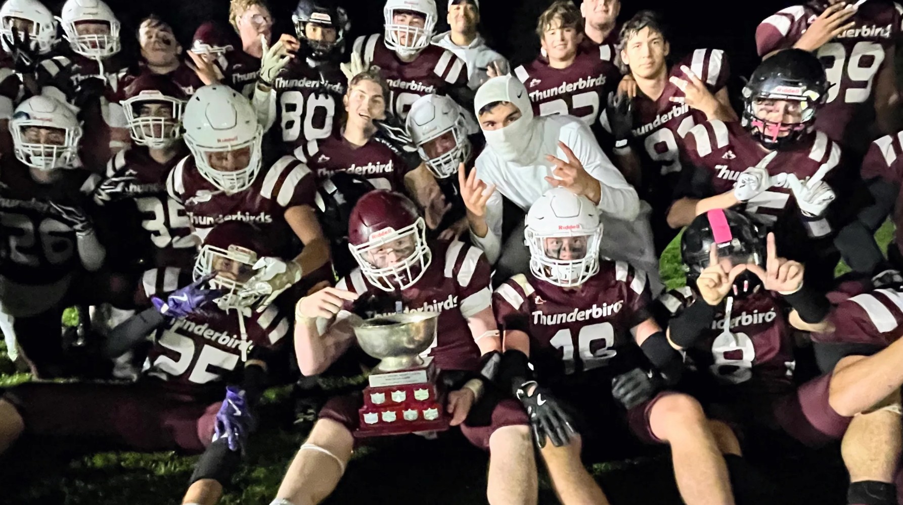 Pauline Johnson Thunderbirds celebrate a 34-14 victory at Delhi's Friday Night Lights contest Oct. 9