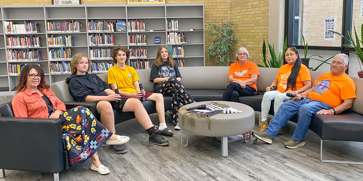 Suzie Miller of Grand Erie's Indigenous Education team (left) with PJ students who hosted survivors of the residential school system sharing experiences as part of a discussion circle