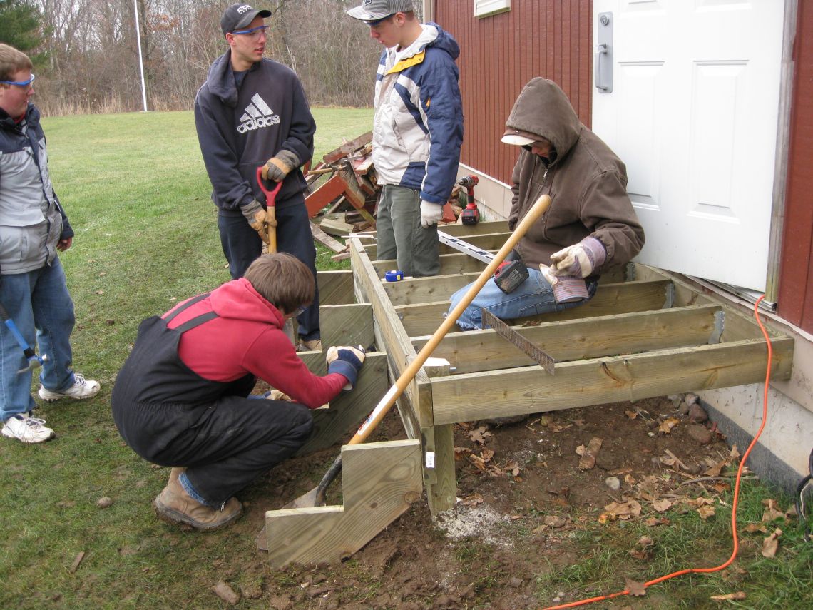 Students building a deck