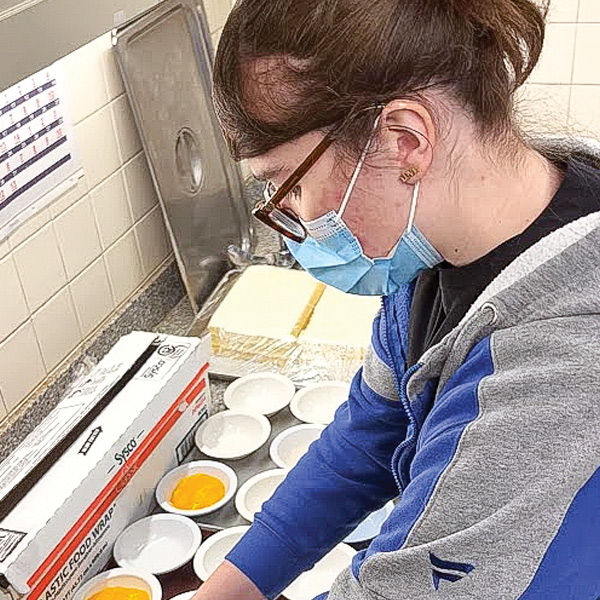 Person working in a kitchen