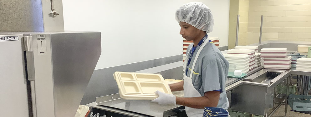 A Project | SEARCH student working in a kitchen environment