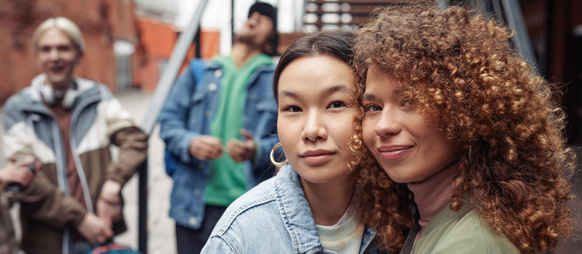 two girls smiling