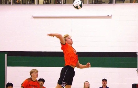 Jacob Slykerman playing volleyball