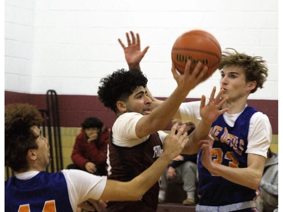br-0206-br-hsbball1 Pauline Johnson Collegiate's Haris Jan drives to the net during his team's AABHN senior boys basketball game at home against McKinnon Park Secondary School on Tuesday. Brian Smiley Photo by Brian Smiley /Brian Smiley/The Expositor