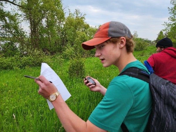 Student participating in an outdoor activity.